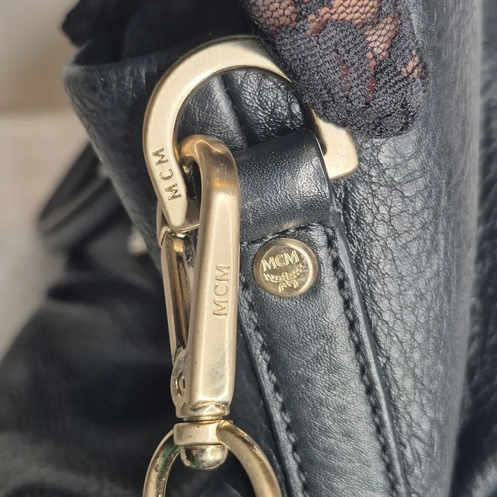 MCM Black Leather Handbag with Gold Accents
